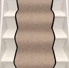 Beige stair runner with black whipped edge