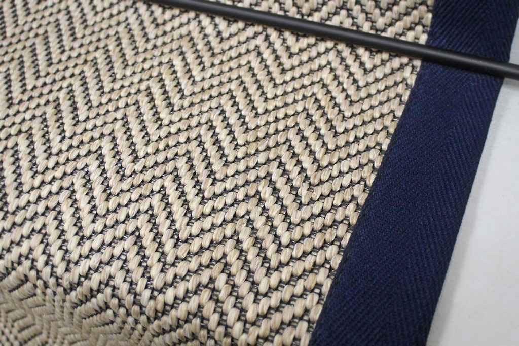 Beige woven berber black taped edge stair runner