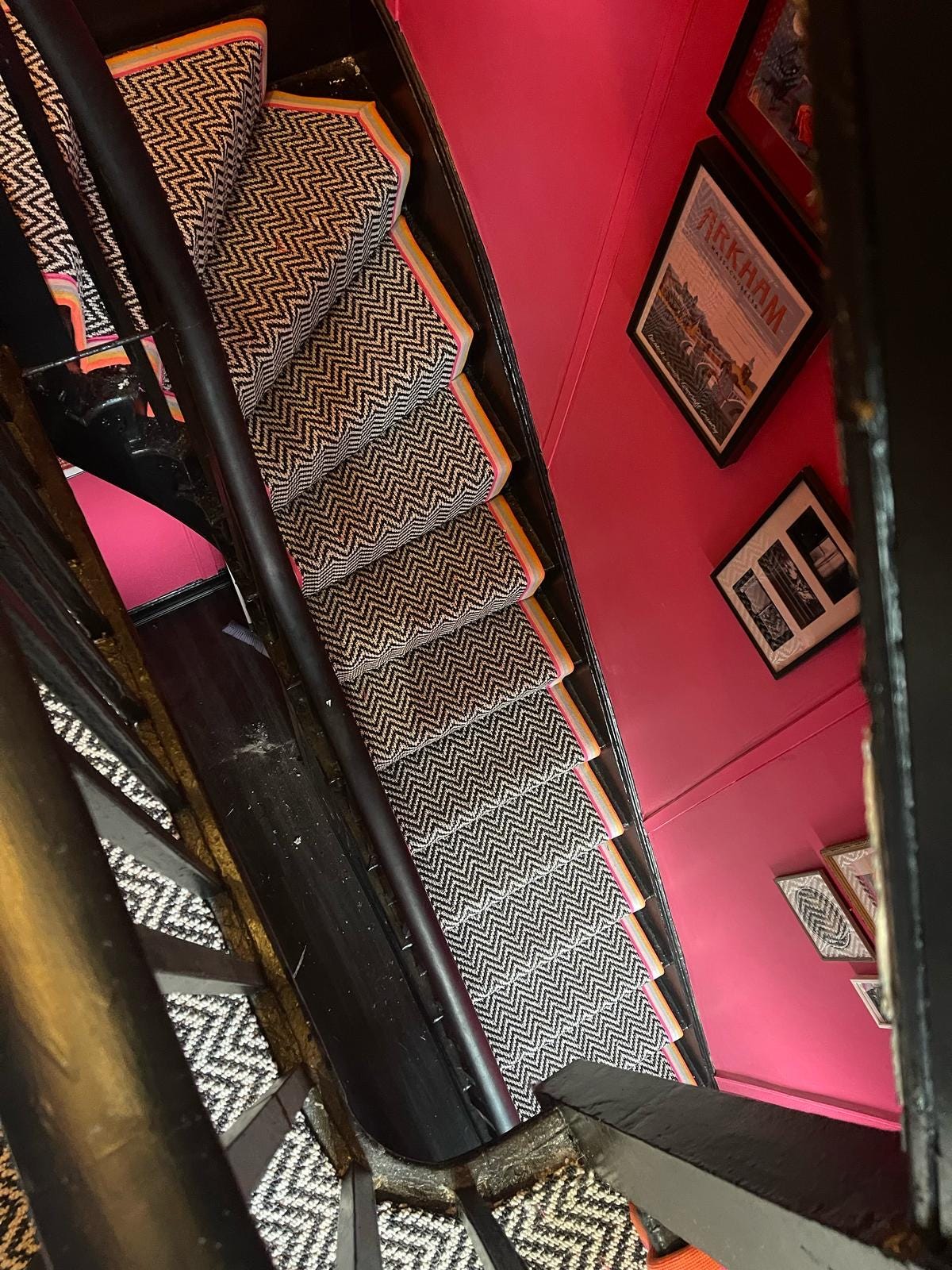 Black and white chevron multi coloured taped edge stair runner