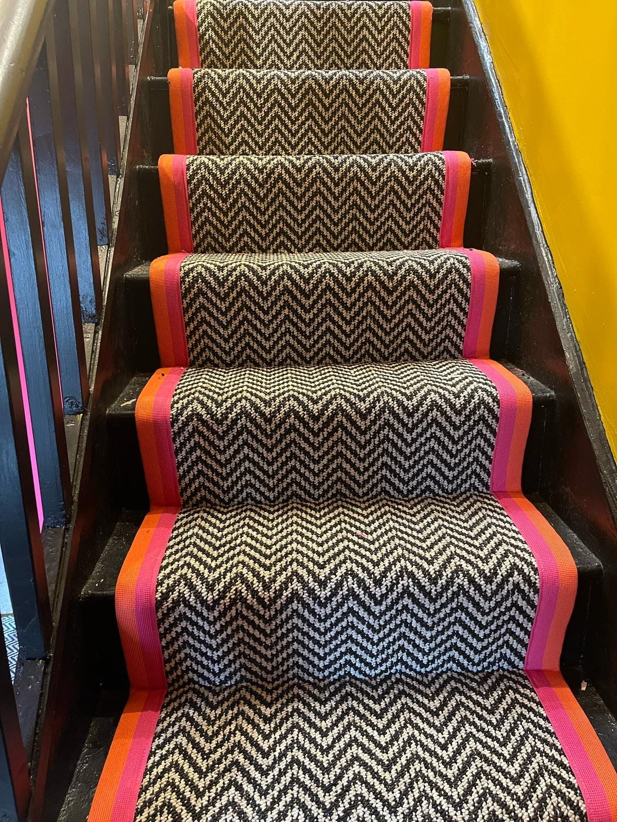 Black and white chevron pink and stitched pink taped edge stair runner