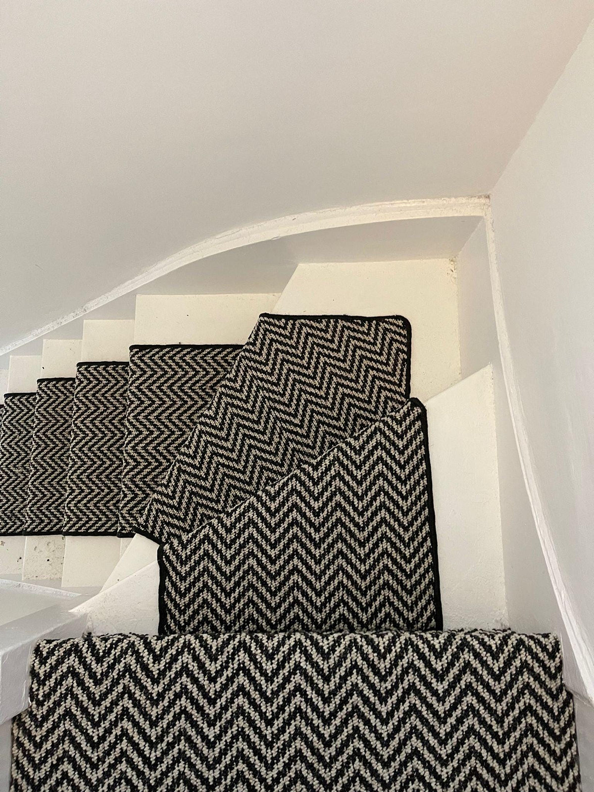 Black and white chevron stair runner