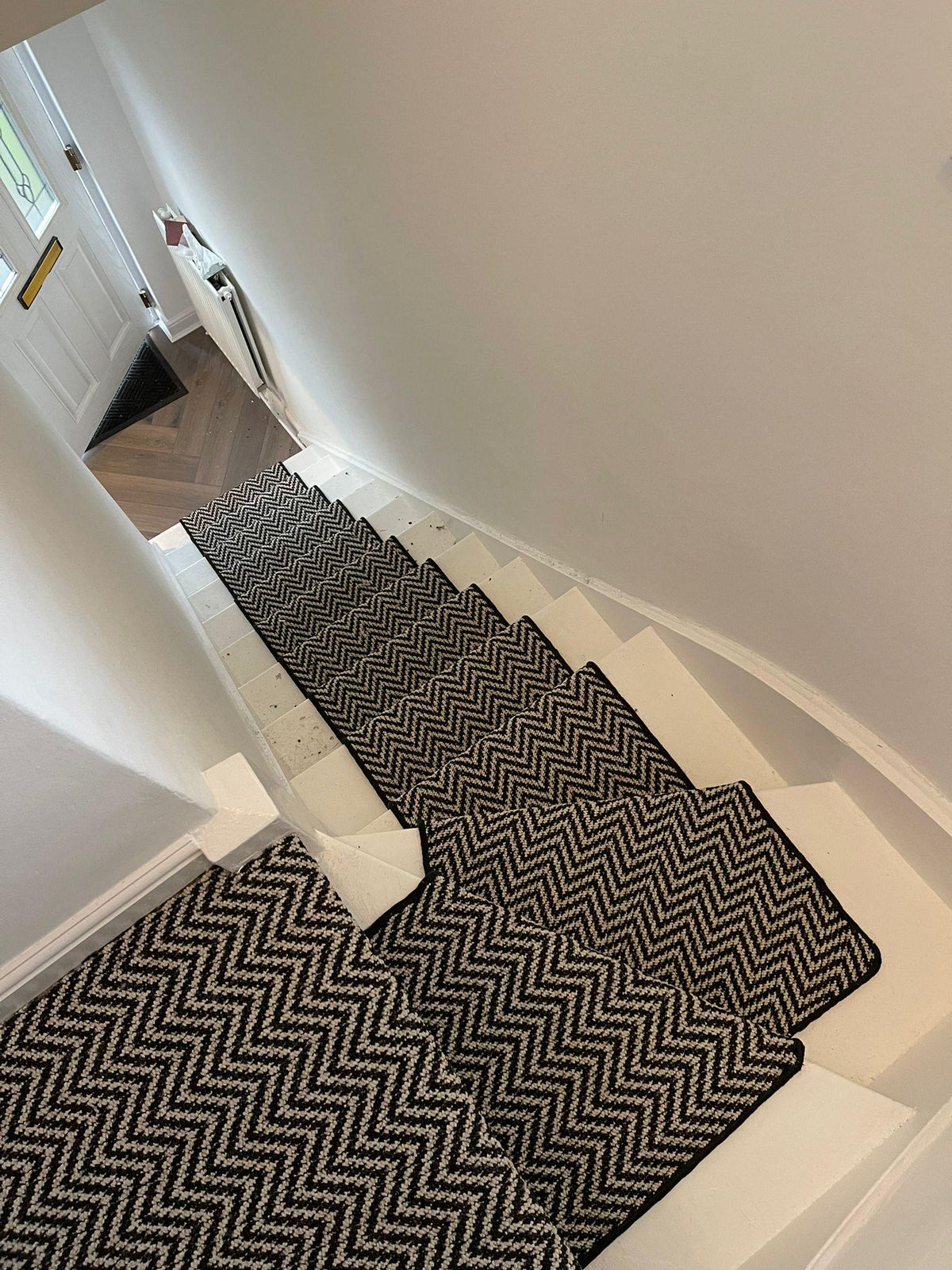 Black and white chevron stair runner