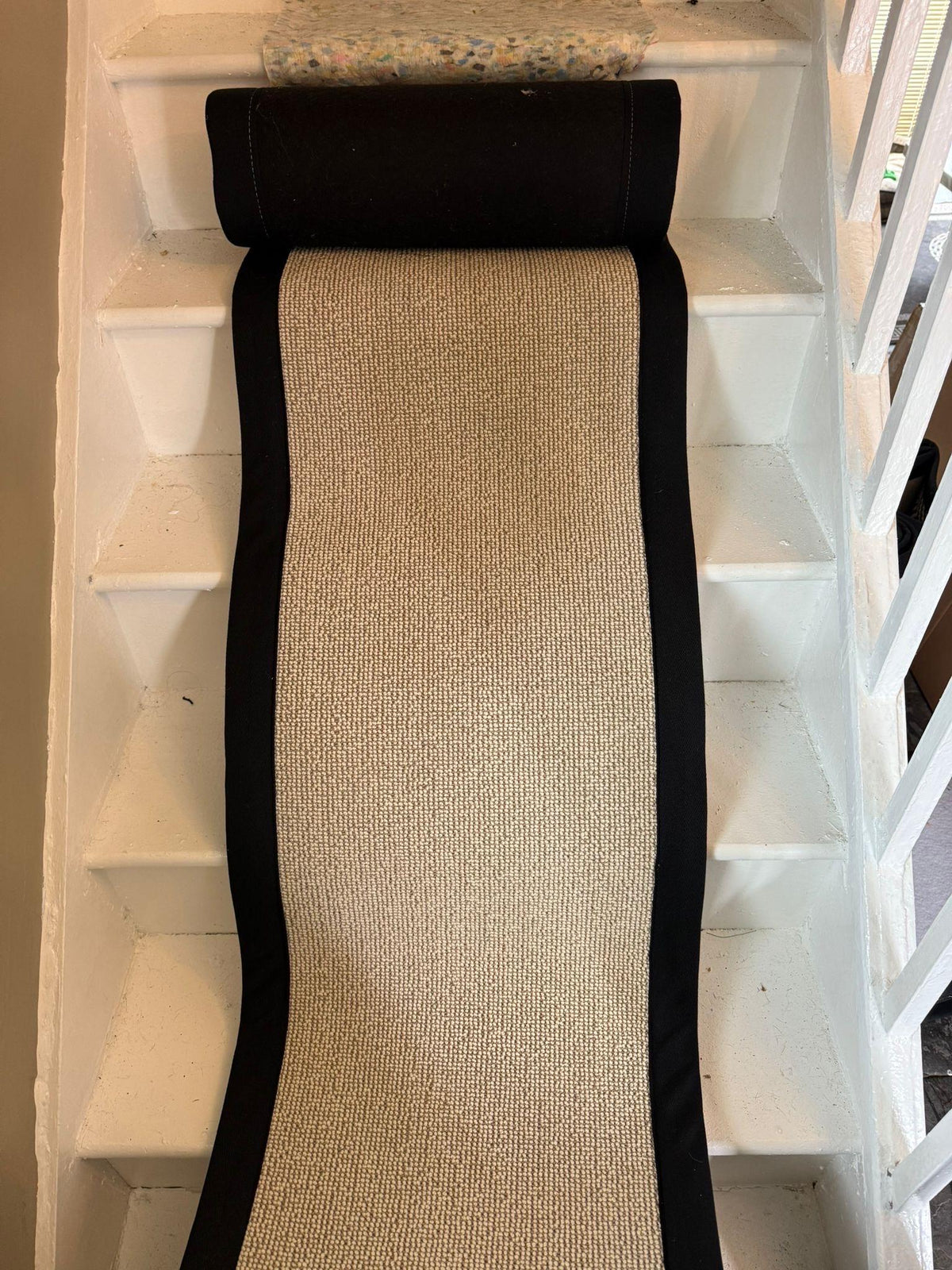 Cream Berber 50% wool 50 polypropylene runner stitched taped edge