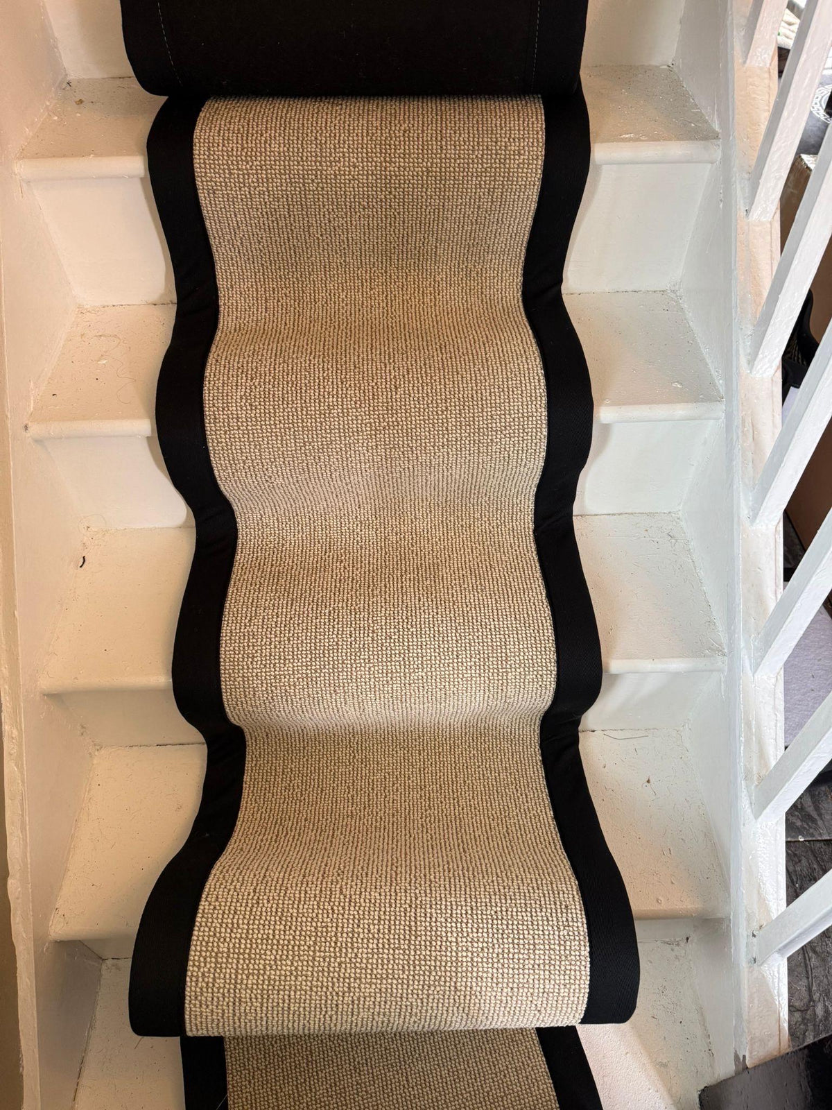 Cream Berber 50% wool 50 polypropylene runner stitched taped edge