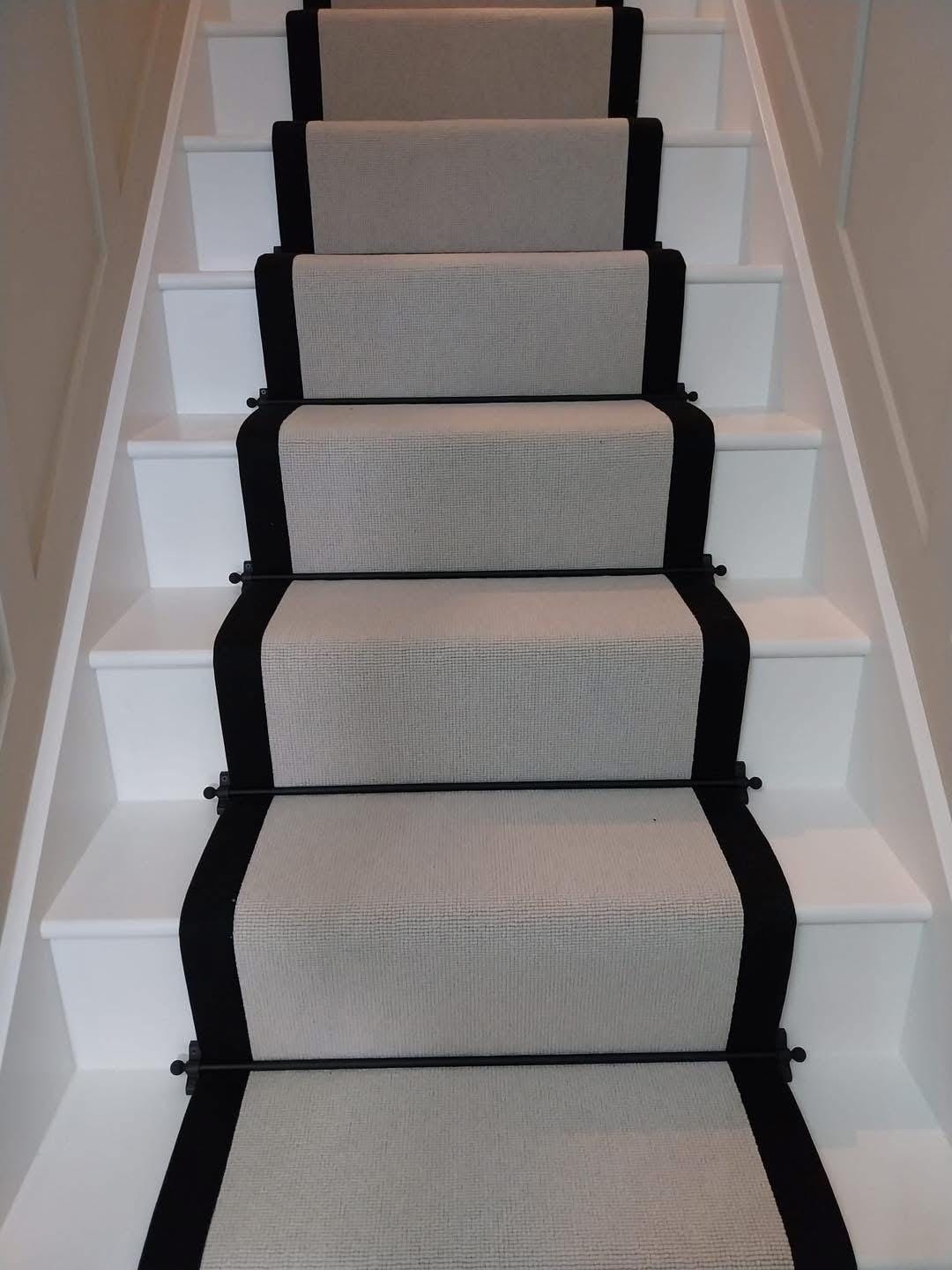 Grey Berber stair runner with stitched black taped edge