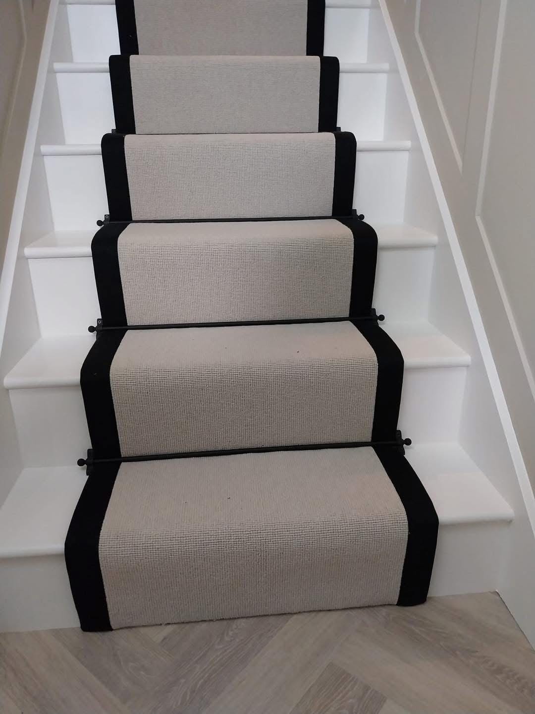 Grey Berber stair runner with stitched black taped edge