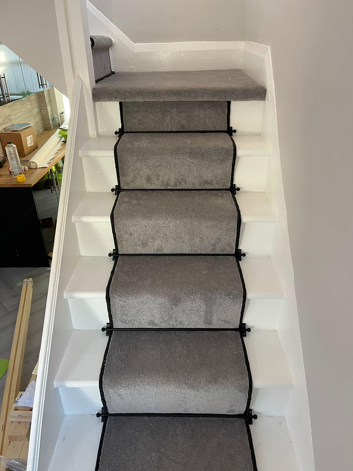 Grey stair runner with black whipped edge