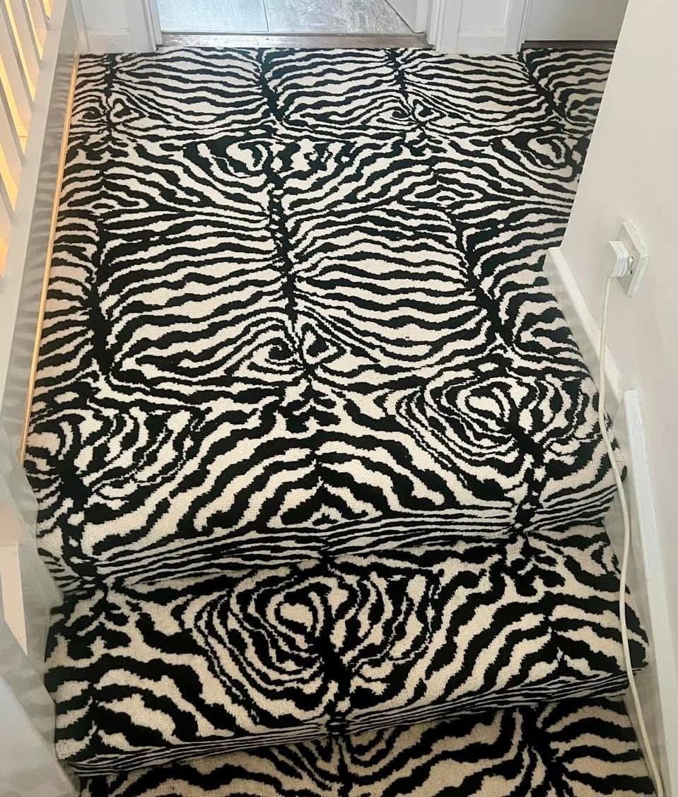 Zebra Wilton stair runner with black taped edge 7m