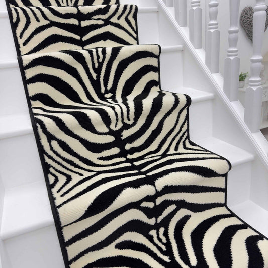 Zebra Wilton stair runner with black whipped edge
